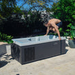 Load image into Gallery viewer, Man jumping into an ice bath