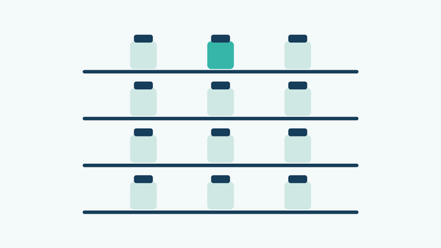 A four-shelf cupboard of jars with one jar picked out on the top shelf