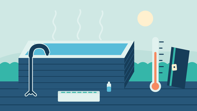 Hot tub on a deck at dusk with a handrail, a non-slip step, a water bottle, a tall thermometer in the comfortable range and a cover leaning against the hedge with its lock fastened