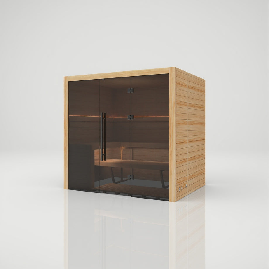 Hekla Traditional 210 indoor sauna in Scandi natural timber finish, angled front view with glass door closed