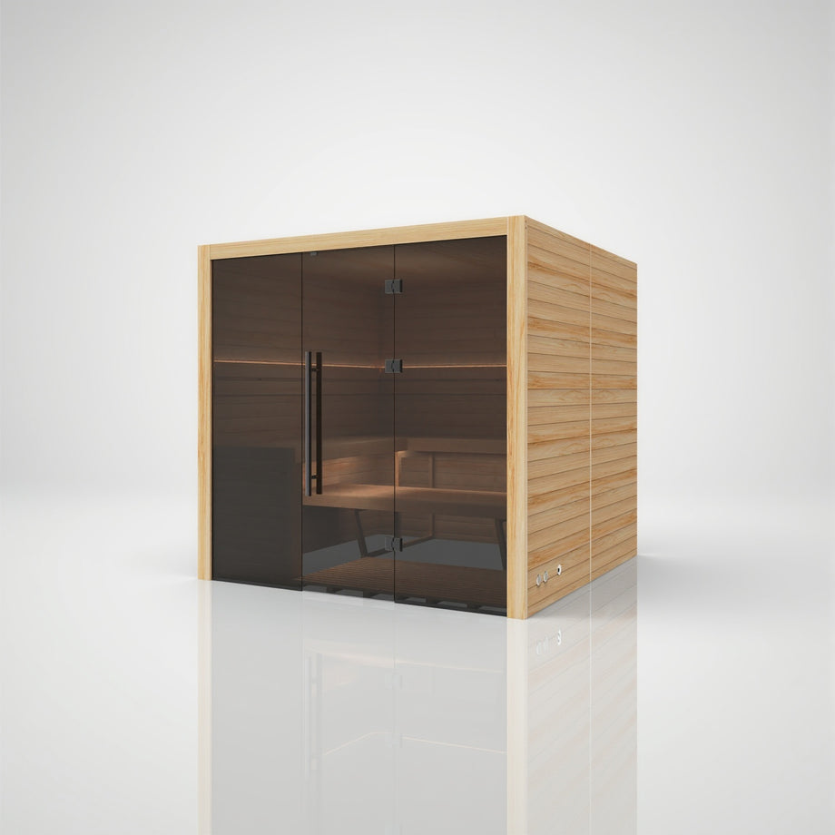 Hekla Traditional 210x indoor sauna in Scandi natural timber finish, angled front view with glass door closed