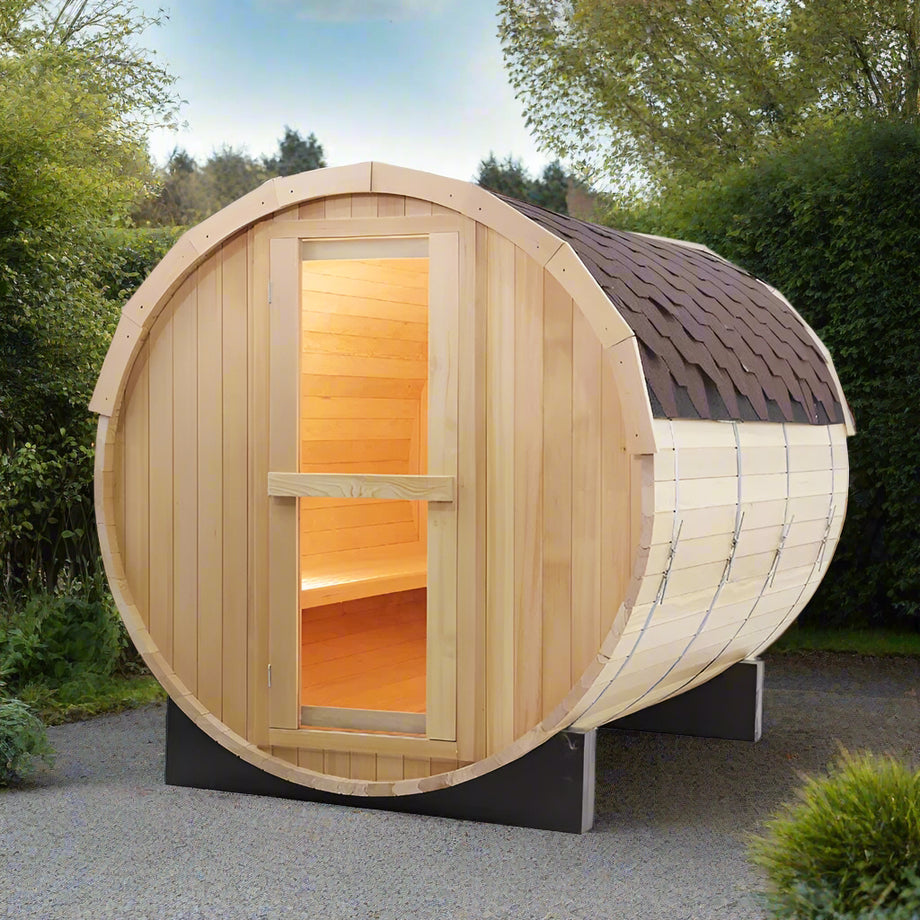 A barrel-shaped outdoor sauna made of wood, with a glass door and benches inside, designed for four people.