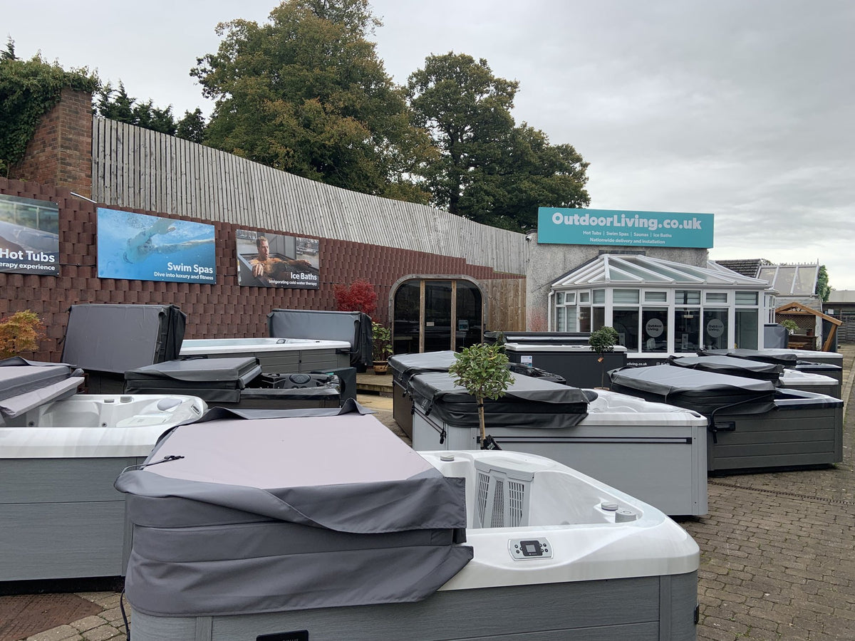 The Outdoor Living showroom in Carlisle, with hot tubs on display outdoors at Houghton Hall Garden Centre