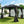 Load image into Gallery viewer, Fortrose 3x4m Black Metal Garden Gazebo with Grey Roof and Sides
