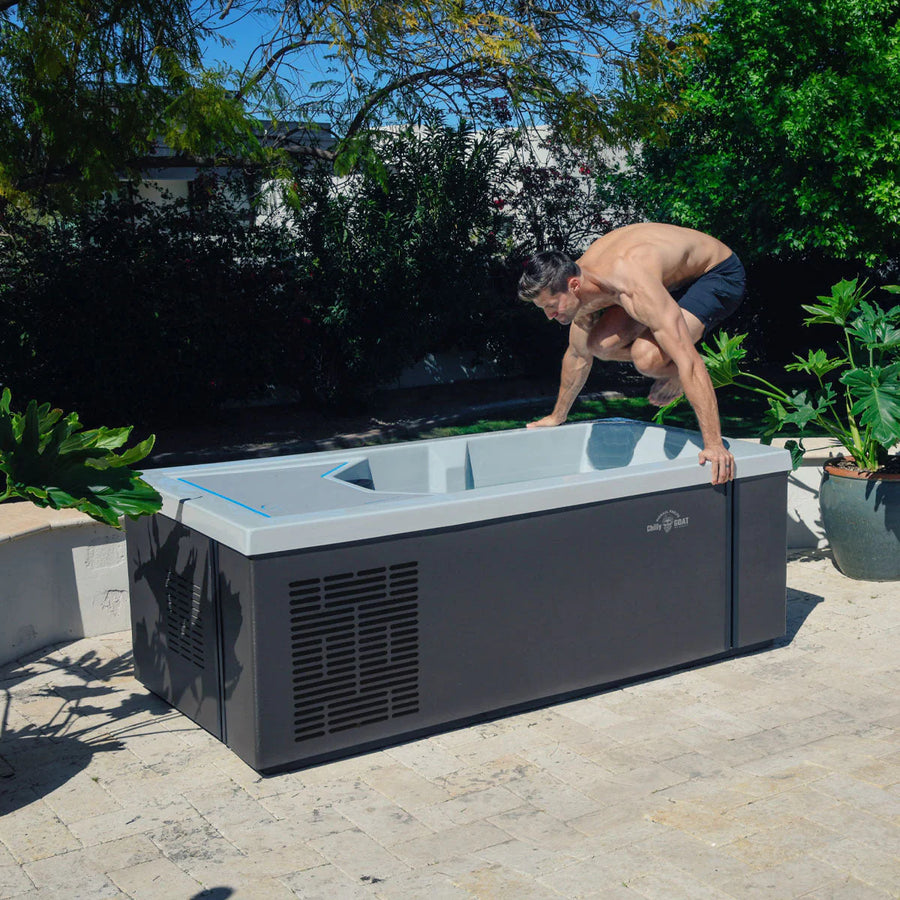 Man jumping into an ice bath
