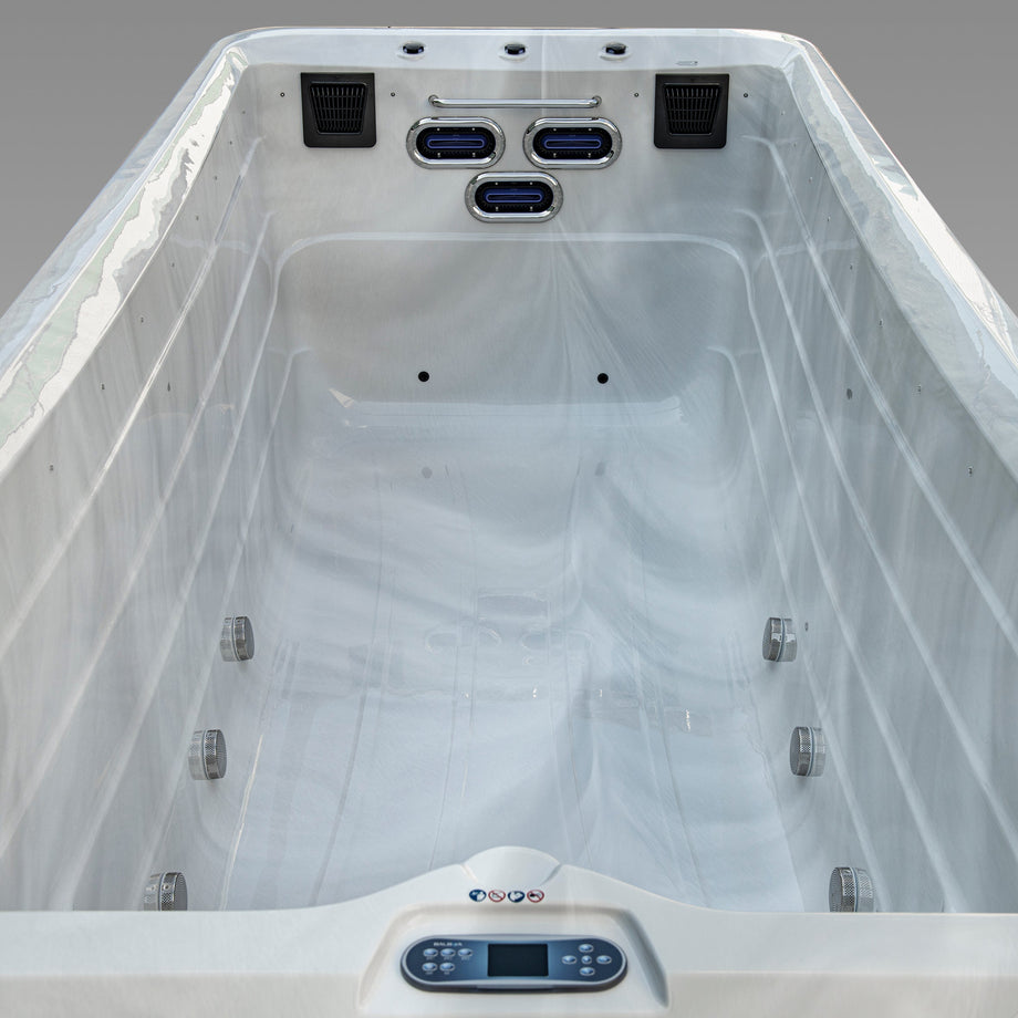 Mini pool swim spa interior with control panel on a gray background