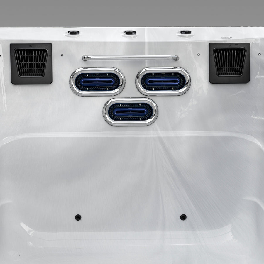 Close-up of a swim spa mini pool interior with and swim jets.