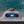 Load image into Gallery viewer, Swim spa mini pool control panel with digital display and buttons, set against the backdrop of a Swim spa mini pool filled with water.
