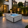 Load image into Gallery viewer, Edge Knightsbridge Hot Tub in Light Grey - London house garden late dusk lifestyle - August 2026
