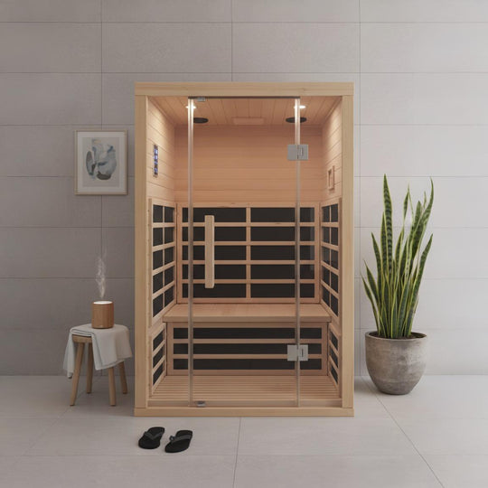 Infrared sauna in a room with a plant and a stool.