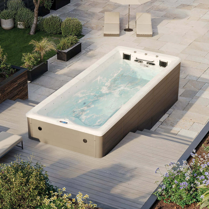 Outdoor mini pool swim spa in an outdoor setting in the garden