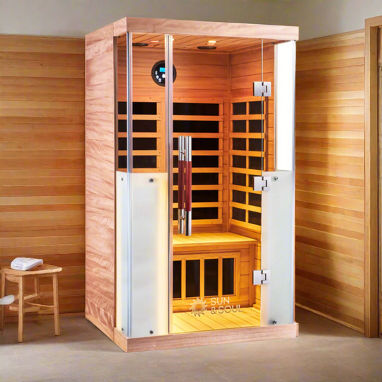 Wooden infrared sauna with glass door on a white background
