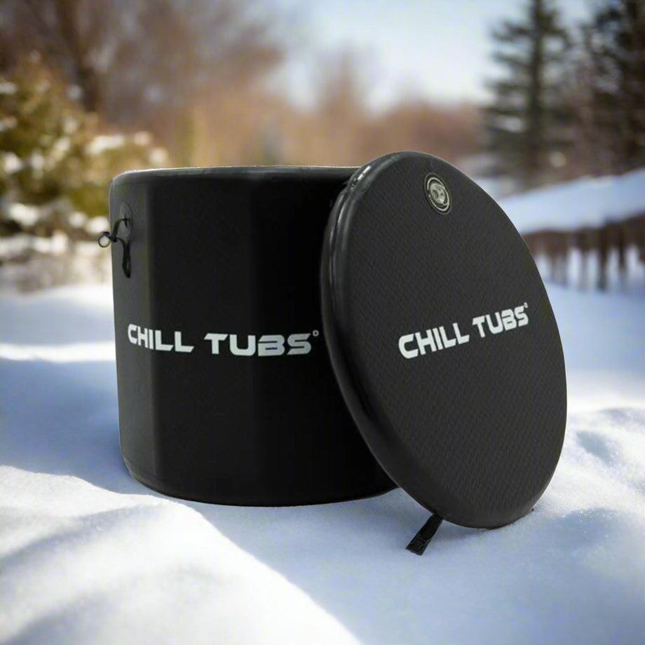 An inflatable black ice bath with the brand name 'Chill Tubs' on it, including a thermo lid and carry bag.