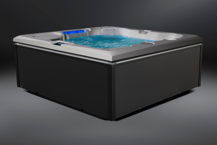 Edge Kensington Hot Tub in Dark Grey — illuminated exterior