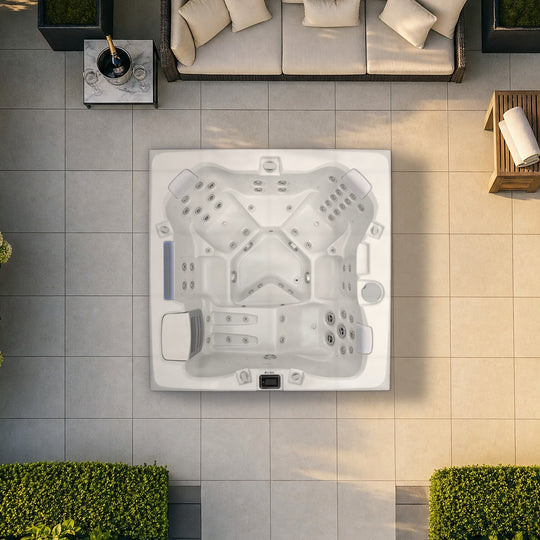The Edge Kensington hot tub in Dark Grey seen from above in a London garden, to scale