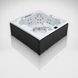 Load image into Gallery viewer, Edge Knightsbridge hot tub in dark grey, angled view on a silver studio floor