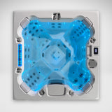 Load image into Gallery viewer, Edge Knightsbridge hot tub from above with blue LED lighting