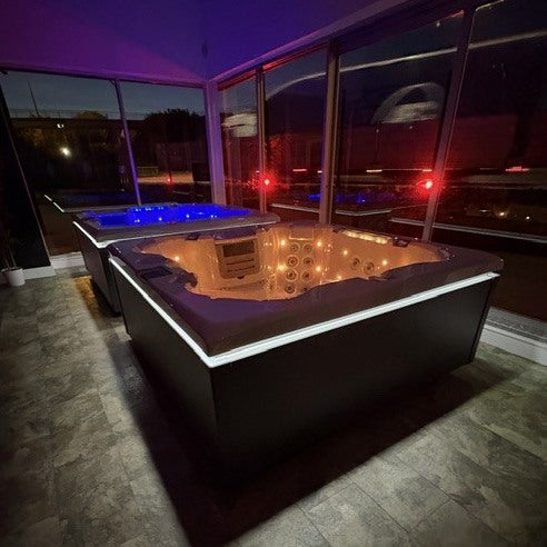 Edge Knightsbridge Hot Tub - supplied customer photo showing hot tubs with evening lighting in a showroom - September 2026