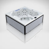 Load image into Gallery viewer, Edge Knightsbridge hot tub in light grey, angled view on a silver studio floor