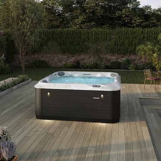 Jacuzzi J-204 hot tub on a timber garden deck (brand lifestyle image)