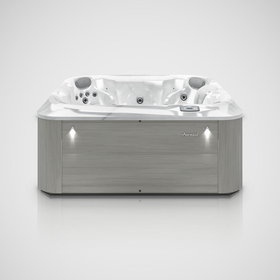 Jacuzzi J-225 hot tub in Platinum with Horizon Gray cabinet, front view