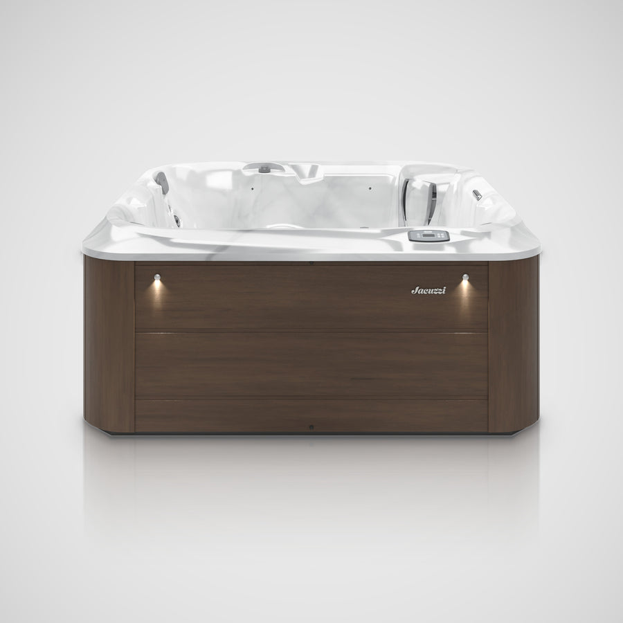 Jacuzzi J-235 hot tub in Platinum with Pecan cabinet, front view