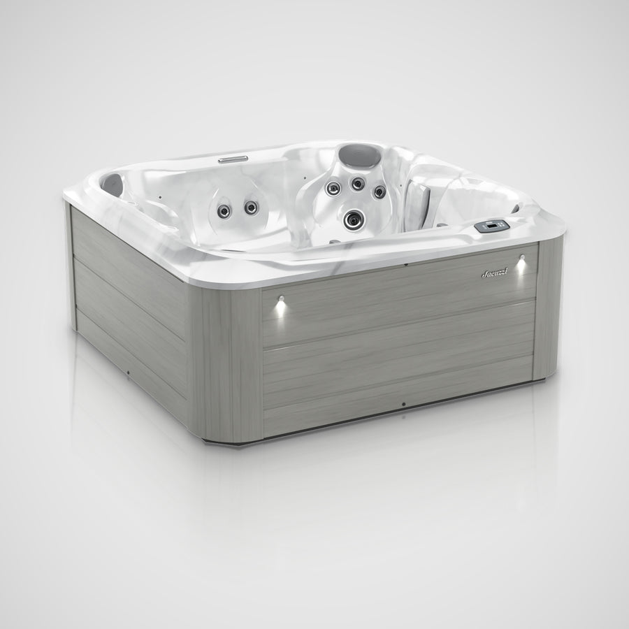 Jacuzzi J-245 hot tub in Platinum shell with Horizon Grey cabinet, angled view
