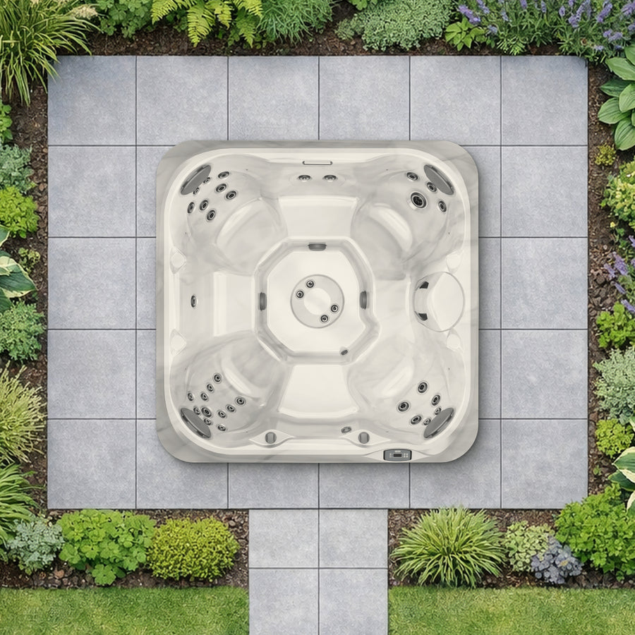 The Jacuzzi J-245 hot tub in Platinum seen from above in a planted garden, to scale (illustrative garden setting)