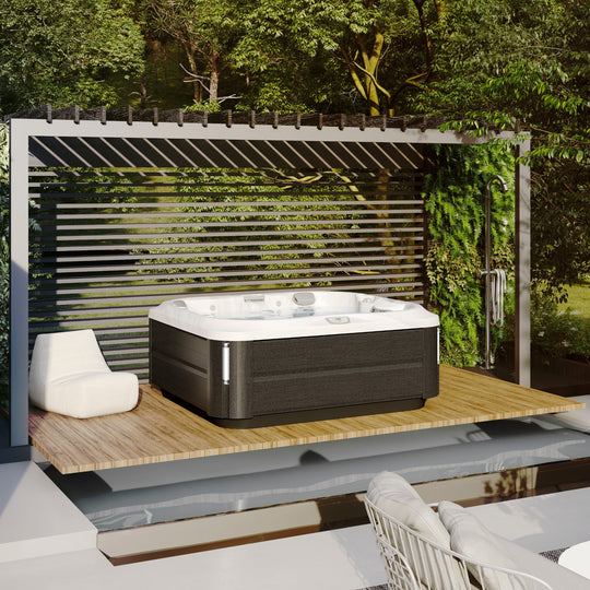 Jacuzzi J-355 hot tub on a raised garden deck (brand lifestyle image)
