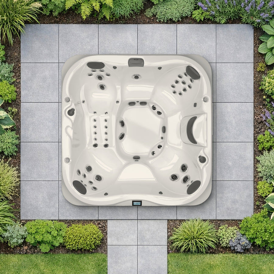 Top-down view of the Jacuzzi J-375 hot tub in a landscaped garden, shown to scale (illustrative garden setting)