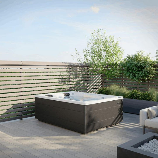 Jacuzzi J-404L hot tub on a screened patio (brand lifestyle image)
