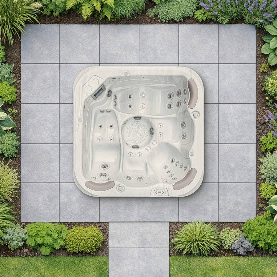 Illustrative top-down view of the Jacuzzi S-550 in a planted garden, shown to scale