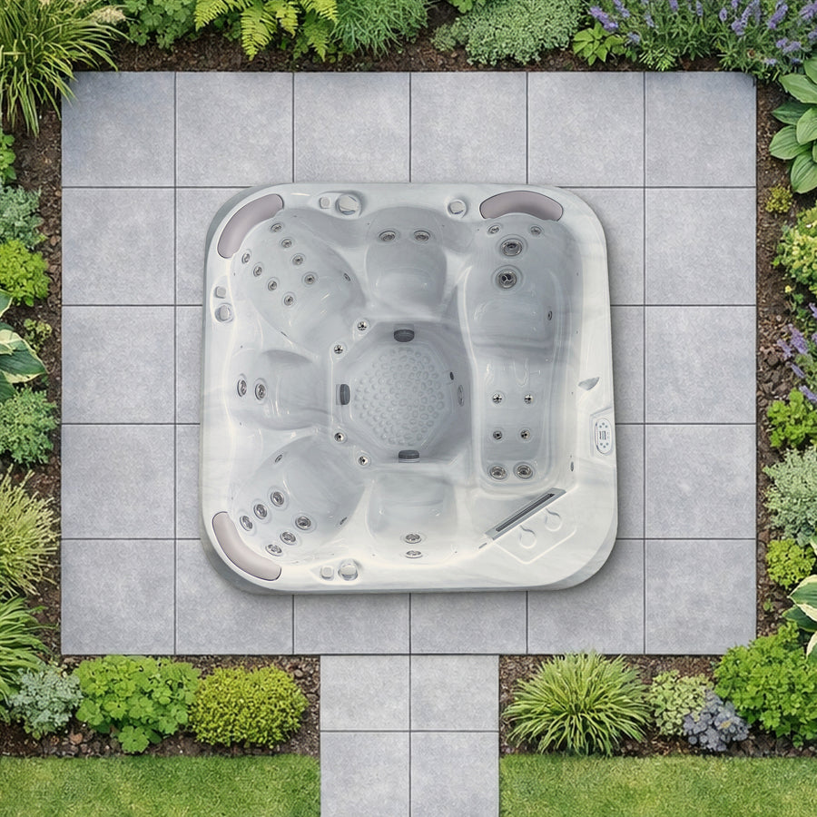 Illustrative top-down garden view of the Jacuzzi S-600 hot tub at true scale on a paved patio
