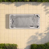 Load image into Gallery viewer, The Outdoor Living Active Pro swim spa seen from above on a planted garden terrace, drawn to true scale on 60 cm paving slabs