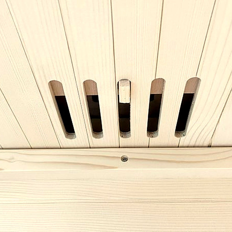 Air vents in the spruce ceiling of the Outdoor Living Aluminium sauna