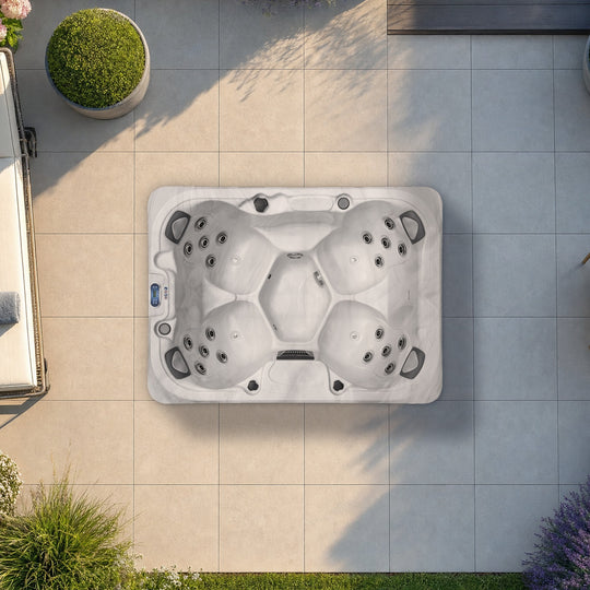 The Outdoor Living Comfort hot tub in Silver Marble seen from above, to scale