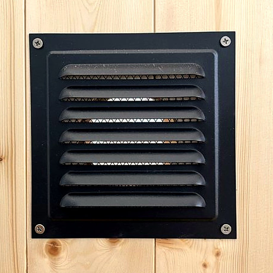 Black outside air vent on the Outdoor Living Cube sauna