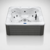 Load image into Gallery viewer, The Outdoor Living Escape hot tub seen from the front in the studio