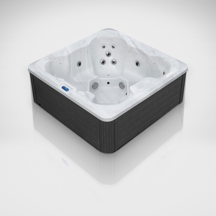 The Outdoor Living Hideaway hot tub seen from a three-quarter angle in the studio