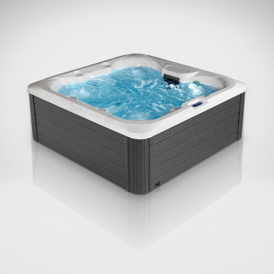 The Outdoor Living Hideaway hot tub filled with the jets running