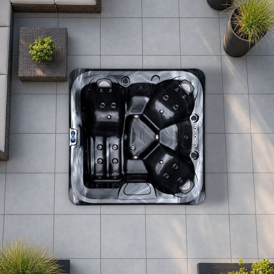 The Outdoor Living Lagoon hot tub in Midnight Opal seen from above, to scale