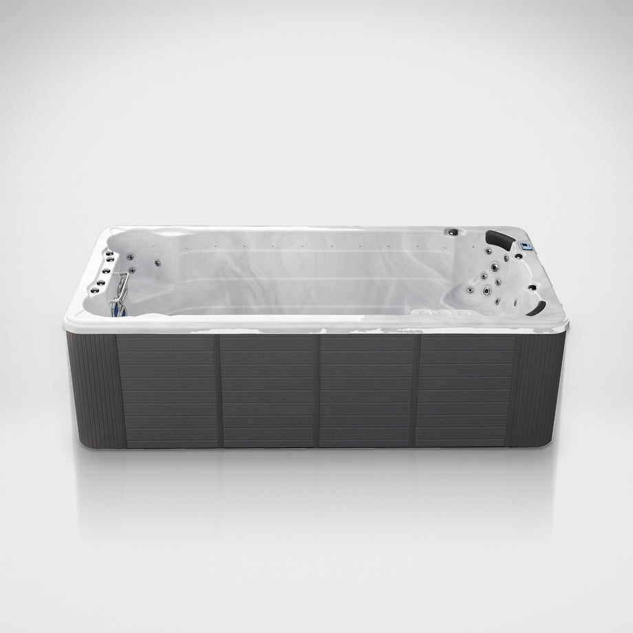 Outdoor Living Active Pro 15ft swim spa on a silver studio floor, view 3