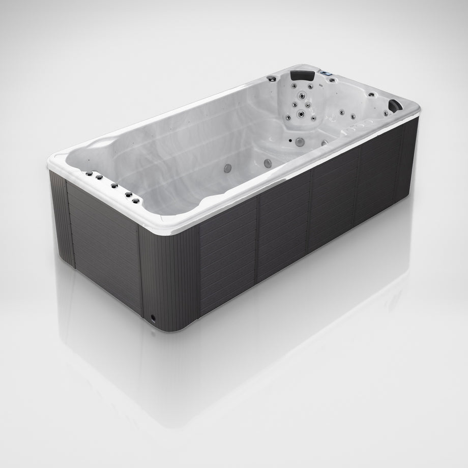 Outdoor Living Active Pro 15ft swim spa on a silver studio floor, view 4