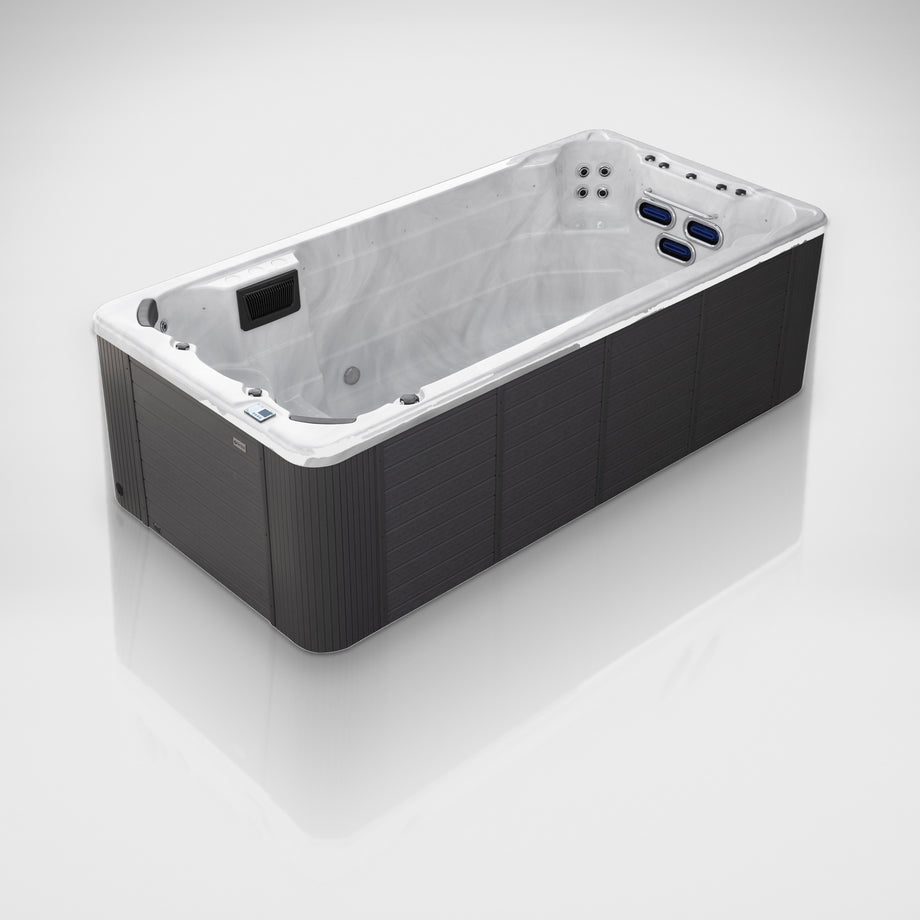 Outdoor Living Active Pro 15ft swim spa on a silver studio floor, view 8