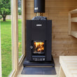 Load image into Gallery viewer, Harvia Linear 18 Compact stove and chimney in a garden sauna
