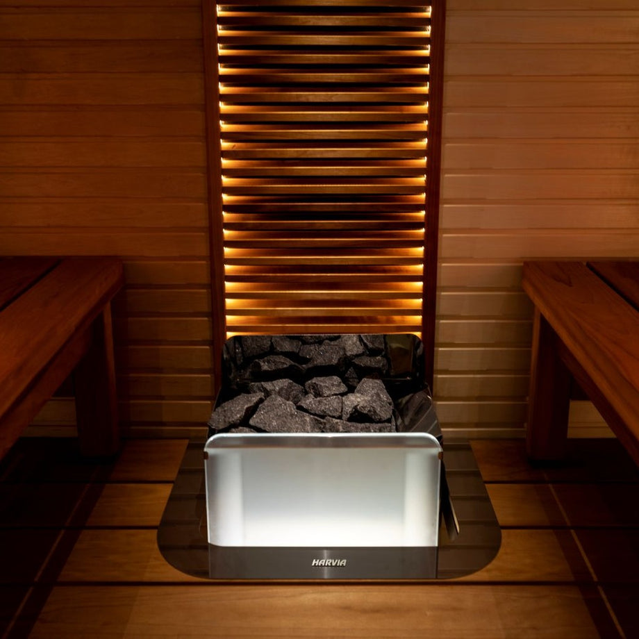 Harvia The Wall heater fitted under a sauna bench with lighting