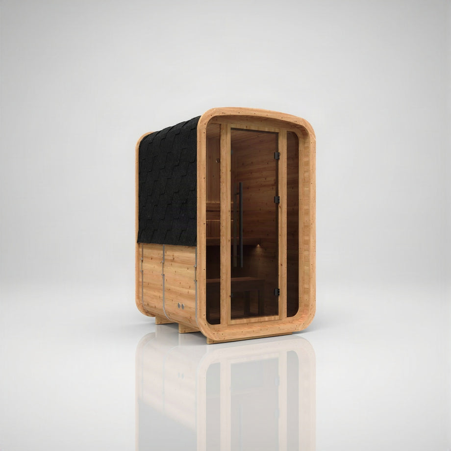 Hekla Mini Cube outdoor sauna in Scandi thermo-spruce, angled view showing the glass front and shingle roof